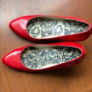 Max Studio red patent pumps